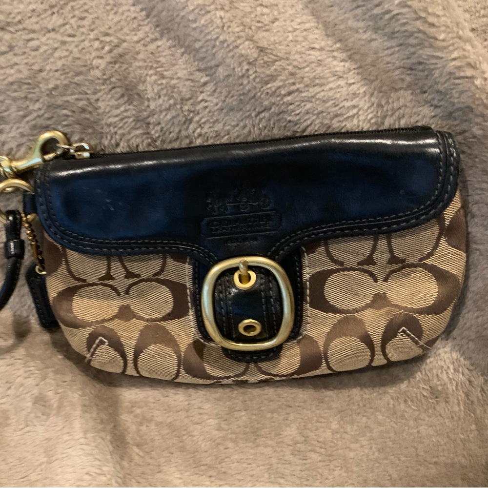 Coach Wristlet with leather flap pocket